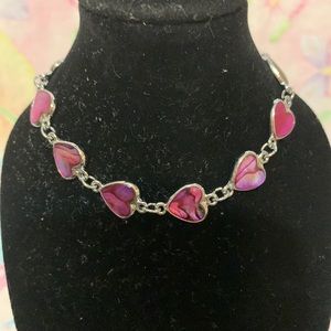 Sterling and dark pink, opal like design hearts. Excellent condition